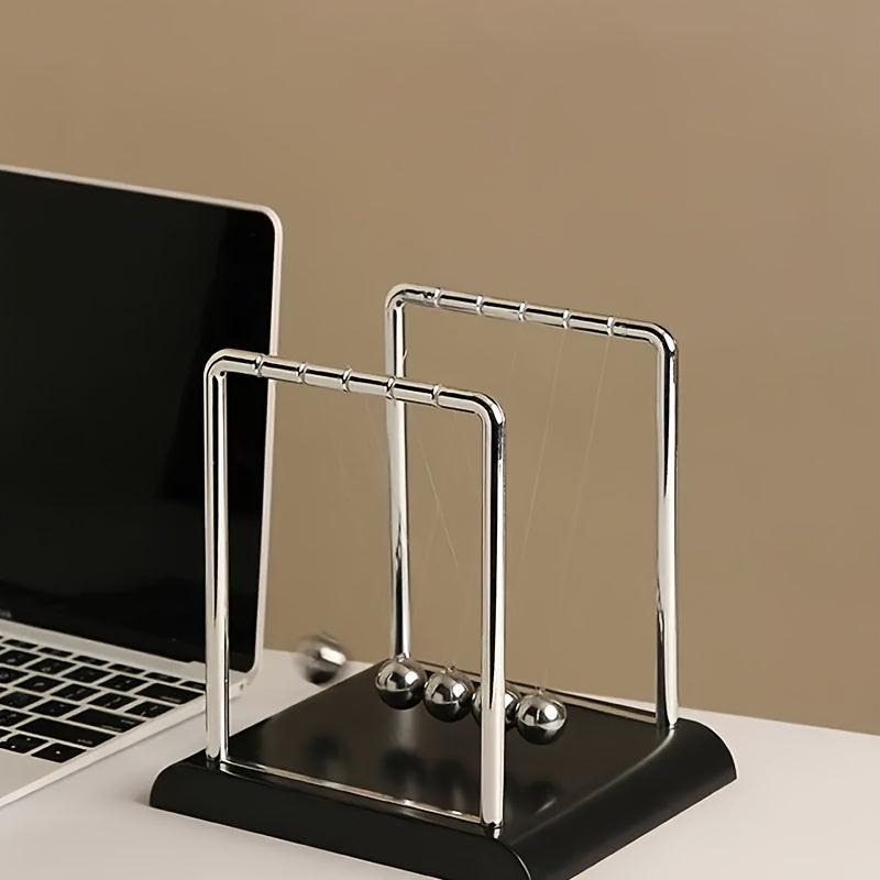 Newton's Cradle, made of durable PP material, is both a desktop physics demonstration pendulum and a stress-relieving decorative piece for offices and homes, ideal as a creative gift..