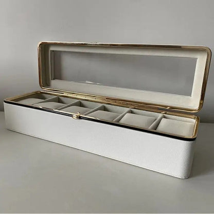 Luxury transparent-lid watch box with 6 fabric-lined compartments, portable and shockproof design, suitable for both men and women. Ideal for home, travel, or gifting—a refined storage solution for fine watches and jewelry. (White)