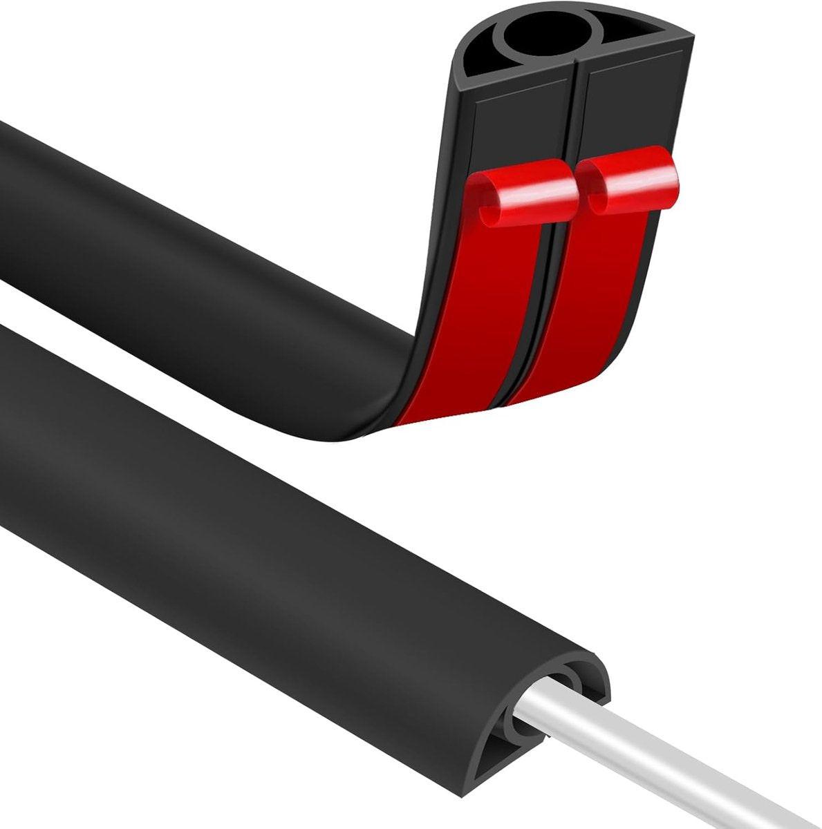 Cable bridge bottom - Self-adhesive cable duct - PVC - Cable duct floor - Concealing cables - Cable protection - Power cables suitable for homes, offices, hotels and warehouses - 100 x 2 x 1 cm - Black.