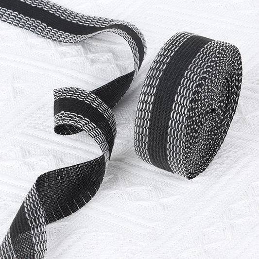 Iron-on tape - easily shorten trousers yourself - Black - hem tape - for shortening - Trouser shortening aid - Iron-on - 10 meters - 2.5 cm wide - Polyester.