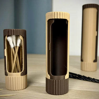 3D-printed compact rotating organizer capsule, 1.3 inches long x 3.4 inches high.