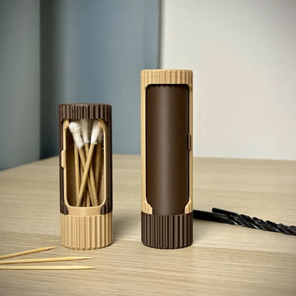 3D-printed compact rotating organizer capsule, 1.3 inches long x 5.9 inches high.