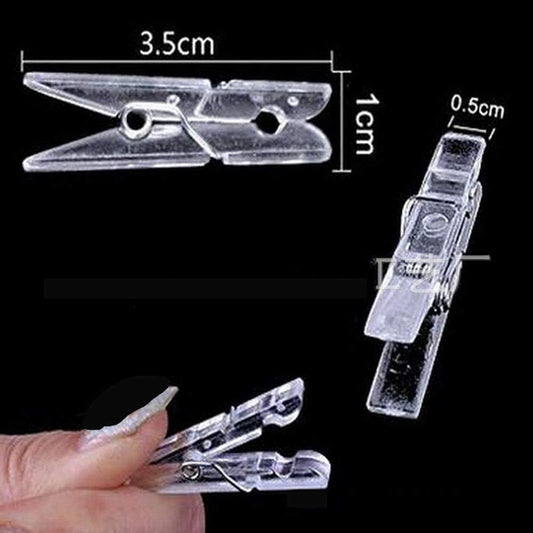 Yansanido 100pcs Mini Clear Plastic Utility Paper Clip, Clothespins Clips, Clothes Line String Clips, mini Clothes Pins for Photo for String Fairy Lights Color Clear(100pcs Clear Plastic Clips)