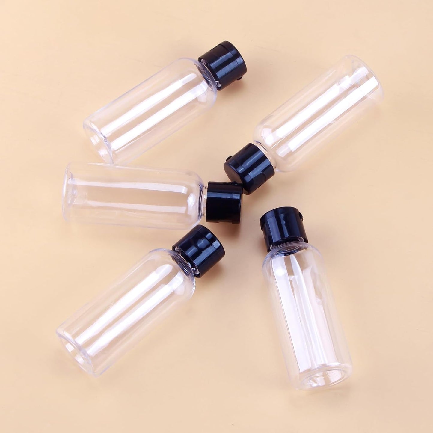 5-piece travel bottle set with flip-cap, 60 ml refillable plastic bottles, empty dispenser for shampoo, travel size, lotion, essential oils, makeup remover, transparent and leak-proof
