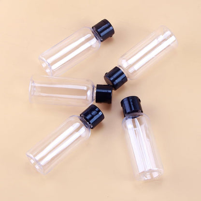 5-piece travel bottle set with flip-cap, 60 ml refillable plastic bottles, empty dispenser for shampoo, travel size, lotion, essential oils, makeup remover, transparent and leak-proof