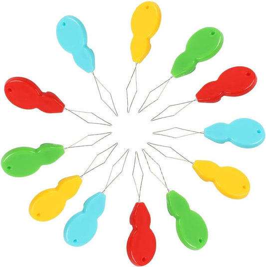Needle threader, pack of 10. The pumpkin-shaped needle threader is easy to use for threading hand-sewing needles when doing cross-stitch clothing repairs â multiple colour designs for mending clothes..