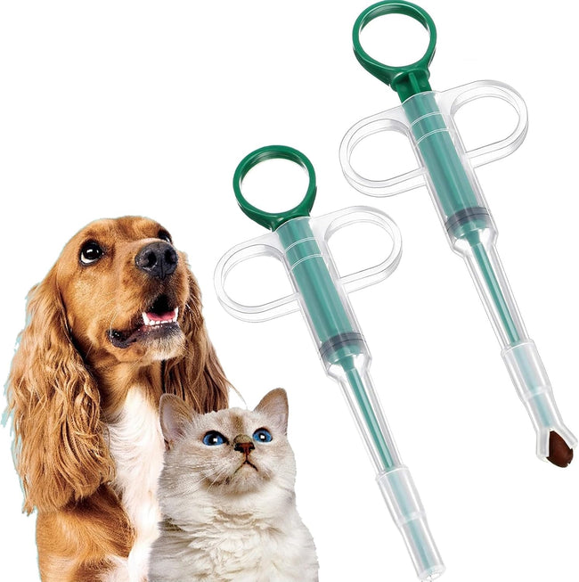 Two-piece set with pet pill poppers, cat pill poppers and cat pill dispensers. Reusable cat pill poppers. Green pill poppers with soft tips for safety and reliability. Handy for both cats and dogs.. Hover Image