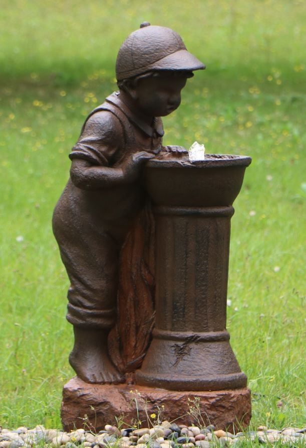 Boy at Water Fountain.