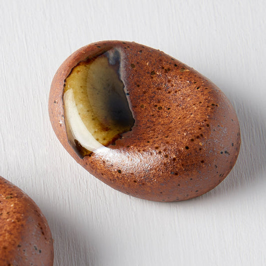 Chopstick Rest Pebble Brown with Green Splash.