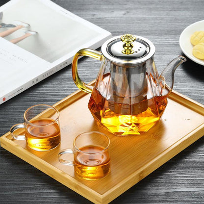 Elegant Glass Teapot with Gold Handle and Stainless Steel Infuser - 600ml Capacity.