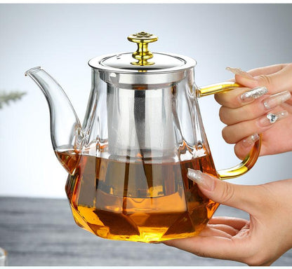 Elegant Glass Teapot with Gold Handle and Stainless Steel Infuser - 600ml Capacity.