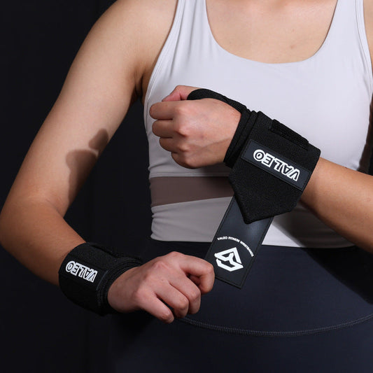 1 Pair Black Heavy-Duty Gym Wrist Wraps for Weightlifting, Powerlifting, and Injury Prevention.