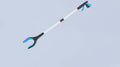 Blue Foldable Grabber Tool with Silicone Non-Slip Claws - Ideal for Litter Picking, Outdoor Use, and Household Cleaning.
