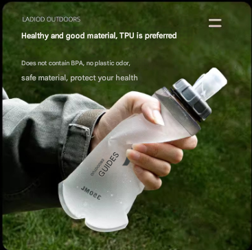 Orange and White Ultra-Lightweight 350ml Soft Running Flask - BPA-Free Collapsible TPU Water Bottle for Hiking, Cycling & Outdoor Sports.
