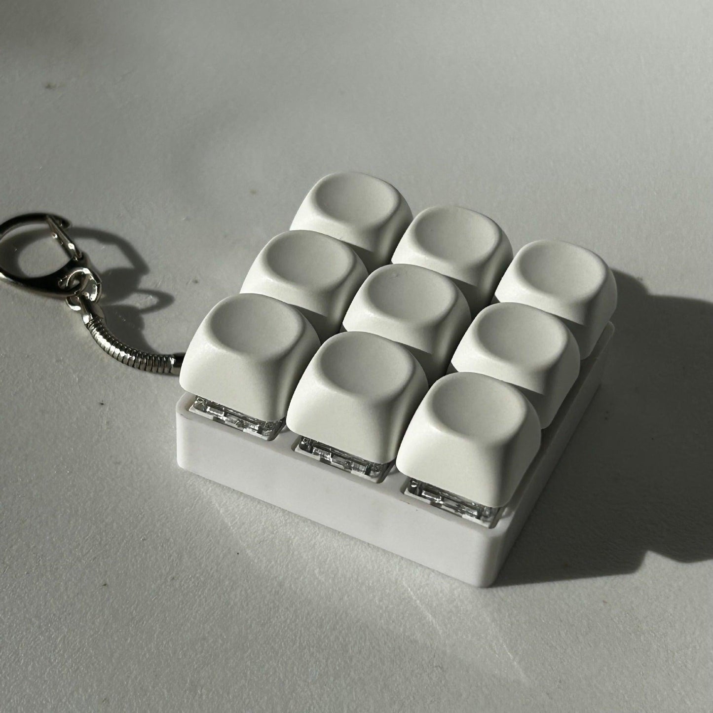 2-Pack White Mechanical 9-Keyboard Fingertip Toy Keychain - Key Pressure Relief, PVC Fingertip Toy.