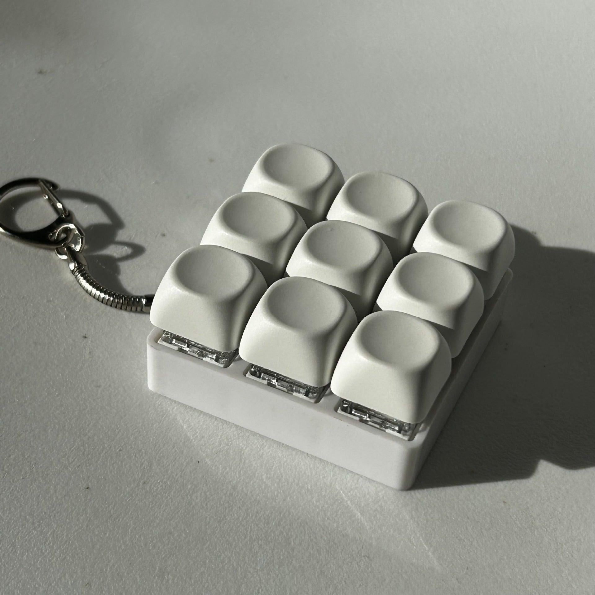 2-Pack White Mechanical 9-Keyboard Fingertip Toy Keychain - Key Pressure Relief, PVC Fingertip Toy.