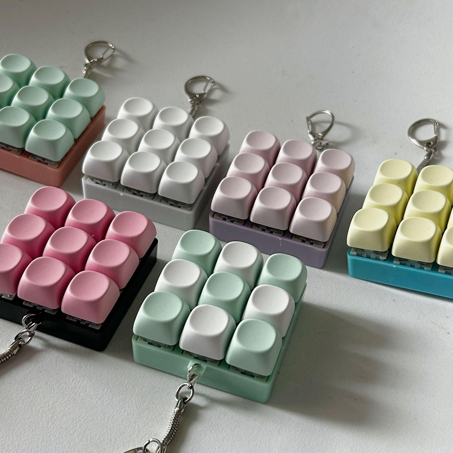 2-Pack White Mechanical 9-Keyboard Fingertip Toy Keychain - Key Pressure Relief, PVC Fingertip Toy.