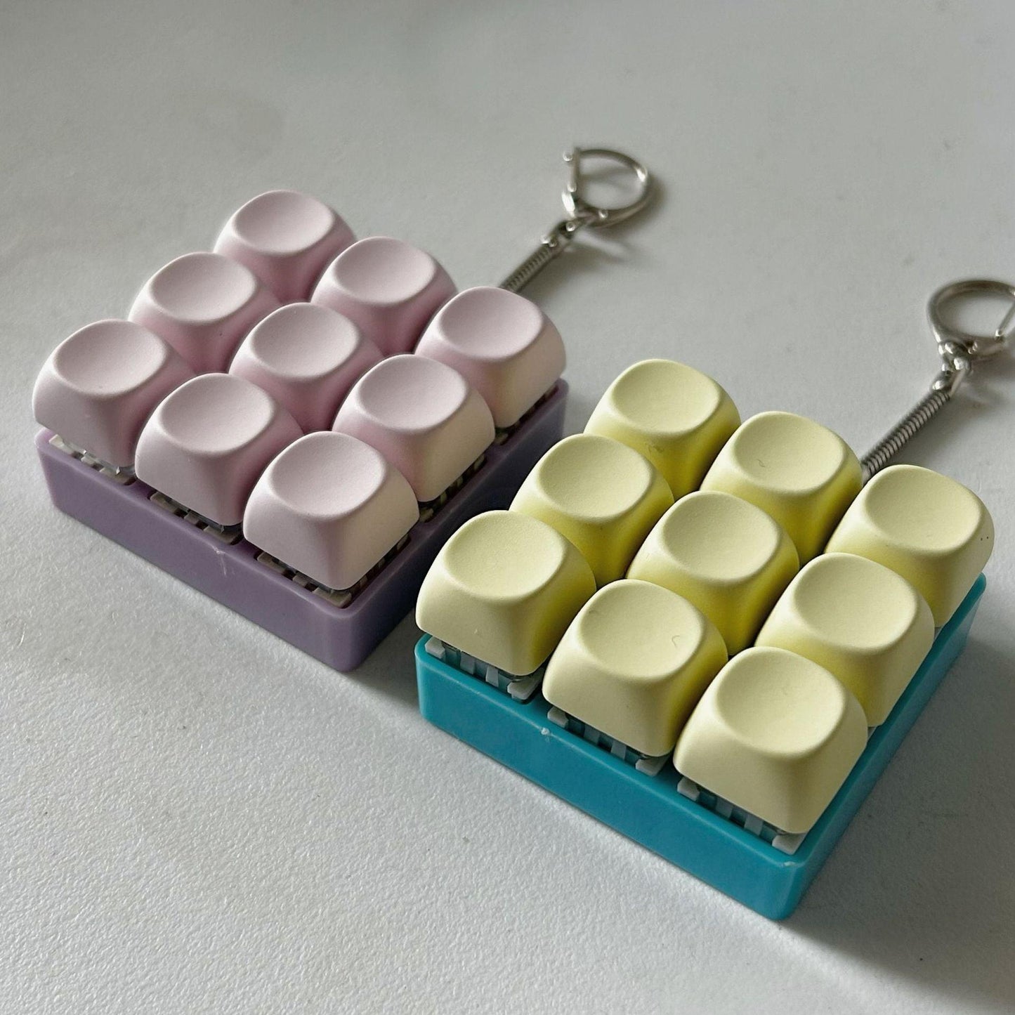 2-Pack Dark Pink Mechanical 9-Keyboard Fingertip Toy Keychain - Key Pressure Relief, PVC Fingertip Toy.