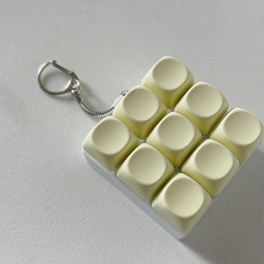 2-Pack Light Yellow Mechanical 9-Keyboard Fingertip Toy Keychain - Key Pressure Relief, PVC Fingertip Toy.