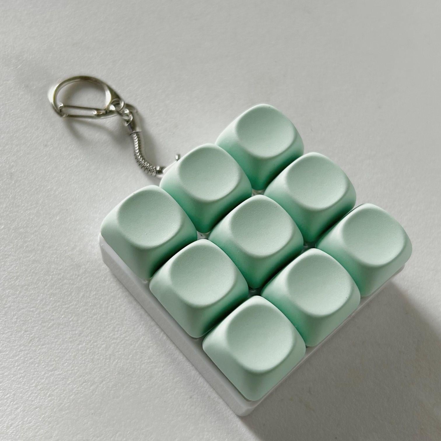2-Pack Green Mechanical 9-Keyboard Fingertip Toy Keychain - Key Pressure Relief, PVC Fingertip Toy.