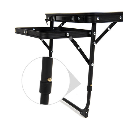 Black Portable Camping Table Heat Resistant Steel Mesh Top Foldable BBQ Desk with Side Wings Adjustable Height Aluminium Frame for Outdoor Picnic.