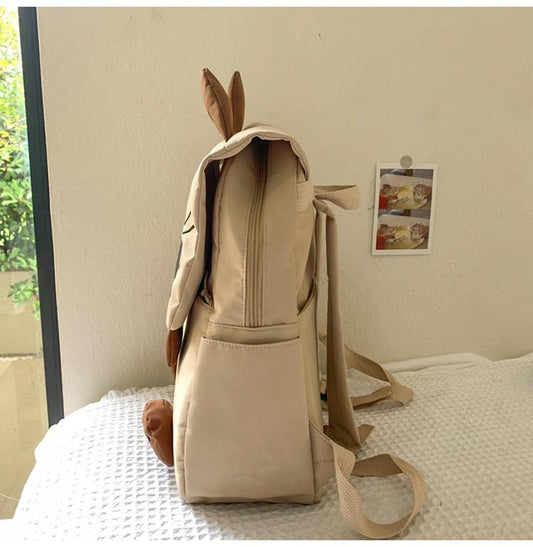 Black Lightweight Nylon Waterproof Schoolbag for Children - Large Capacity Daypack with Ugly-Cute Cat Design.
