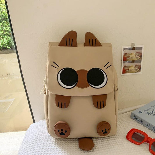 Khaki Lightweight Nylon Waterproof Schoolbag for Children - Large Capacity Daypack with Ugly-Cute Cat Design.