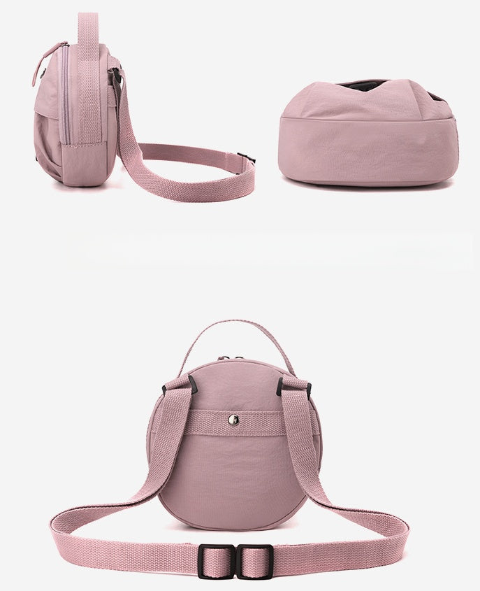 Black Fashionable Round Crossbody Bag with Water-Resistant Nylon and Multi-Pocket Design for Daily Travel Lightweight Hands-Free Storage Solution for Local Professionals