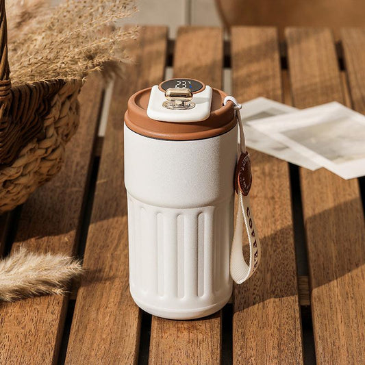 Coffee color Smart Digital Insulated Coffee Mug with 316 Stainless Steel Inner Liner â Vacuum-Sealed Travel Tumbler with Temperature Display, USB-C Rechargeable, Leak-Proof Lid for Hot and Cold Beverages.