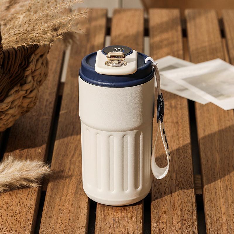 Blue Smart Digital Insulated Coffee Mug with 316 Stainless Steel Inner Liner â Vacuum-Sealed Travel Tumbler with Temperature Display, USB-C Rechargeable, Leak-Proof Lid for Hot and Cold Beverages.
